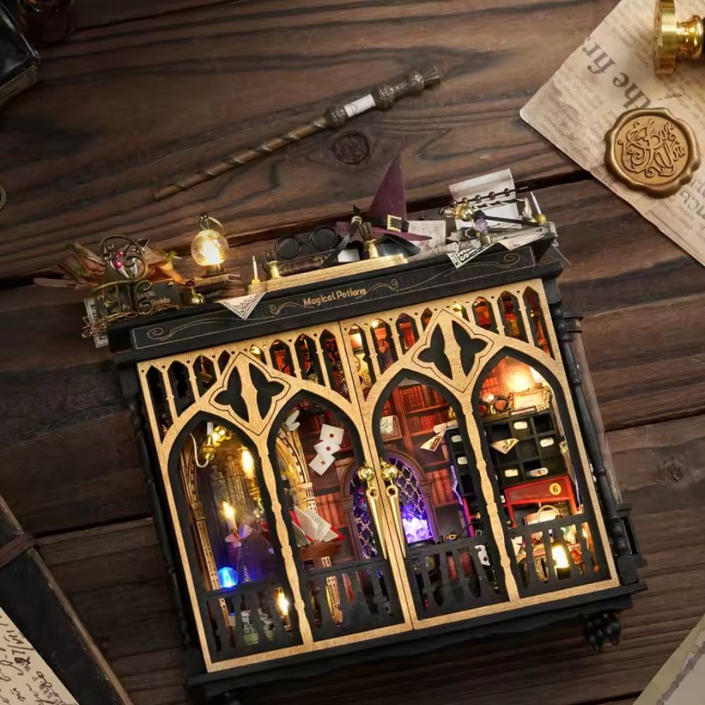 Starspell Cabinet miniature house doors open : wizarding magic study with glowing cauldron and mirror