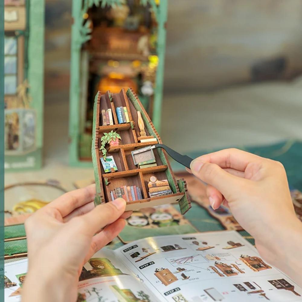Library checkout counter detail in Panda Bookshop book nook — panda at bamboo bookshop desk