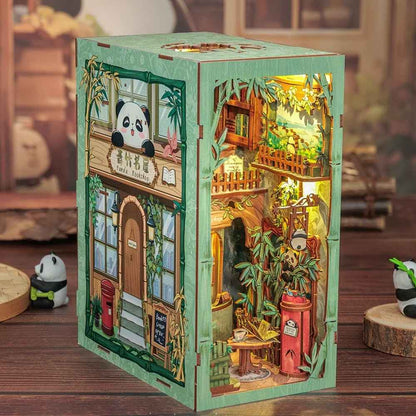 Rotating panda mechanism in Panda Bookshop book nook — panda turns to reveal second side of bamboo bookcas